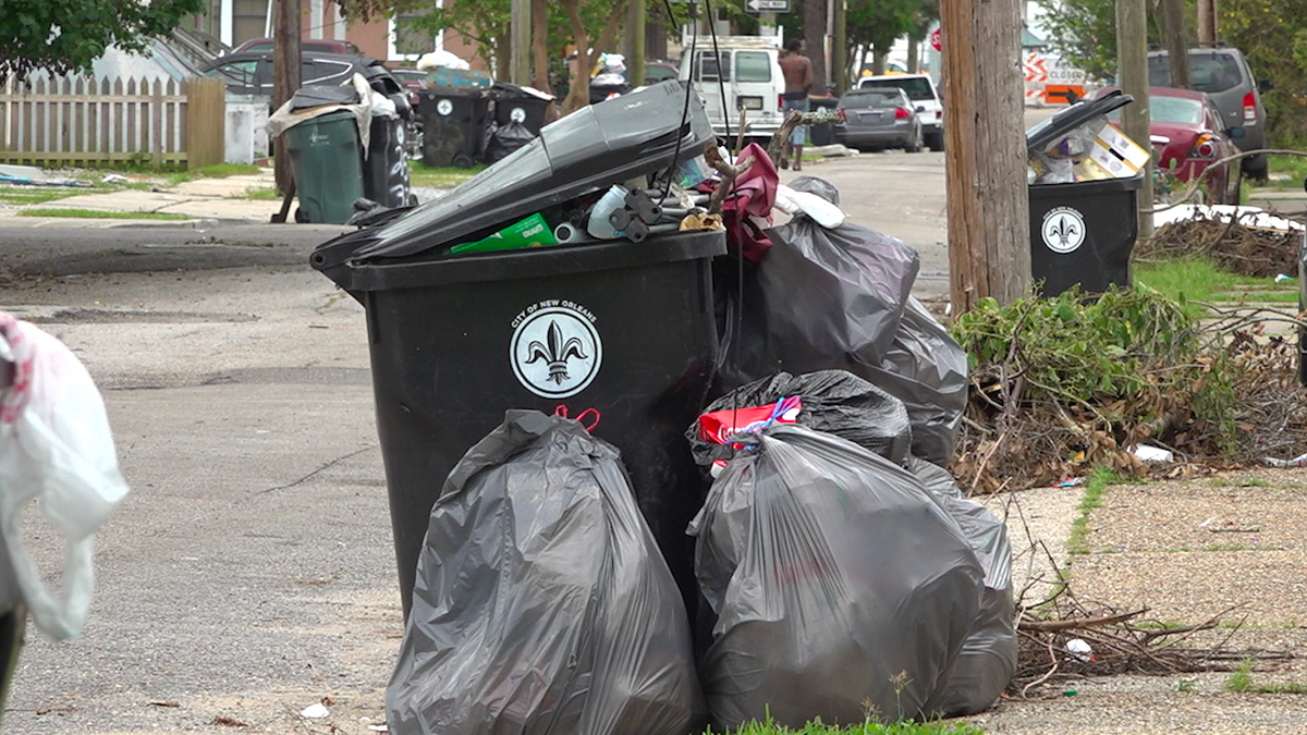 Trash bins in New Orleans are filled to the brim as city sanitation workers struggle to keep up with the demand for trash pick-up following Hurricane Ida.