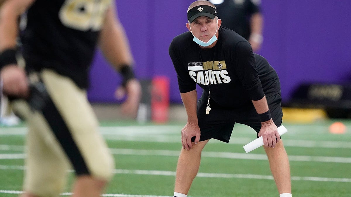 Sean Payton looks onto field