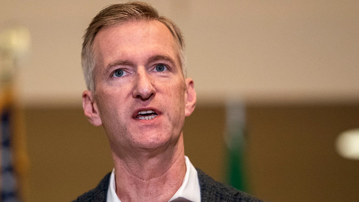 Portland's mayor Ted Wheeler speaks at a press conference in 2020 