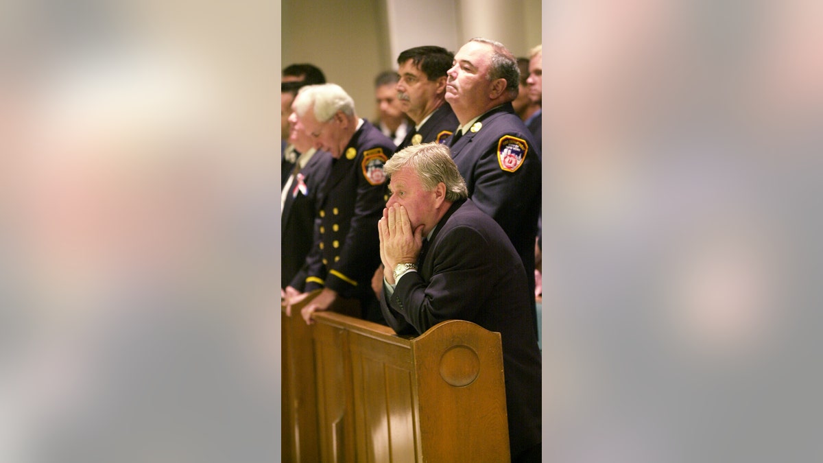 NYC firefighters at a service for fallen fireman, Gregory Saucedo