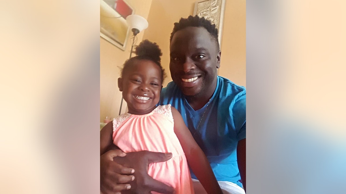 Travell Miller of Chicago and his daughter (Facebook)