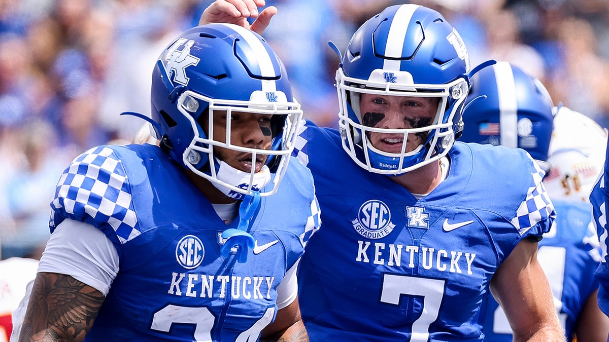 Kentucky quarterback Will Levis (7) celebrates a Chris Rodriguez Jr. (24) touchdown during the first half of an NCAA college football game against Louisiana-Monroe in Lexington, Ky., Saturday, Sept. 4, 2021. (AP Photo/Michael Clubb)