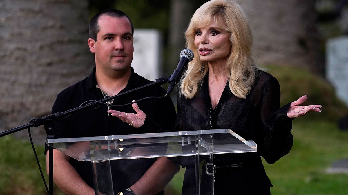 Actress Loni Anderson and her son Quinton Reynolds speak before the unveiling of a memorial sculpture of her former husband and Quinton's father, the late actor Burt Reynolds.