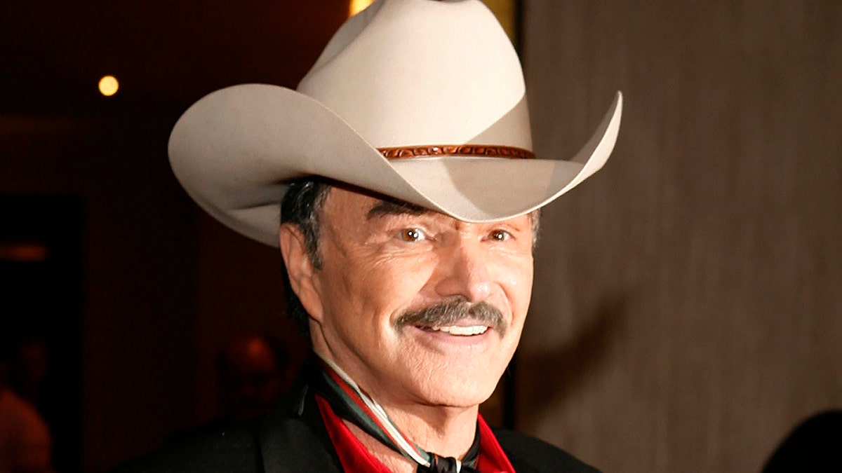 In the Aug. 12, 2006, file photo, actor Burt Reynolds poses for photographers at the Golden Boot Awards in Beverly Hills, Calif. 