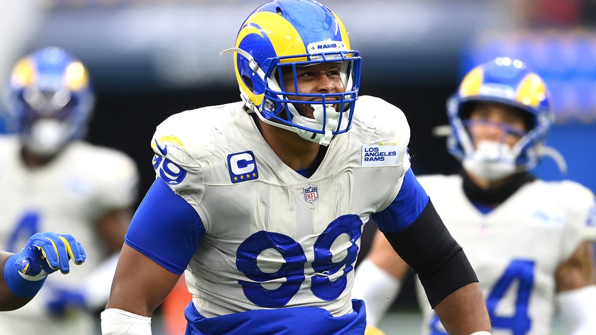 Sep 26, 2021; Inglewood, California, USA;  Los Angeles Rams defensive end Aaron Donald (99) celebrates after a play in the second half of the game against the Tampa Bay Buccaneers at SoFi Stadium.