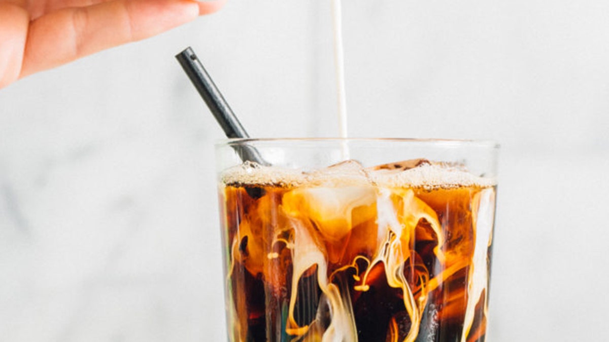 Start International Coffee Day with this refreshing peanut butter iced latte from PB2 Foods.