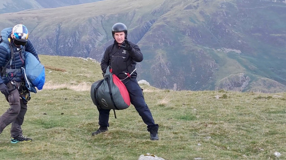 Tom Cruise landed his helicopter in England's Lake District and surprised some hikers. 