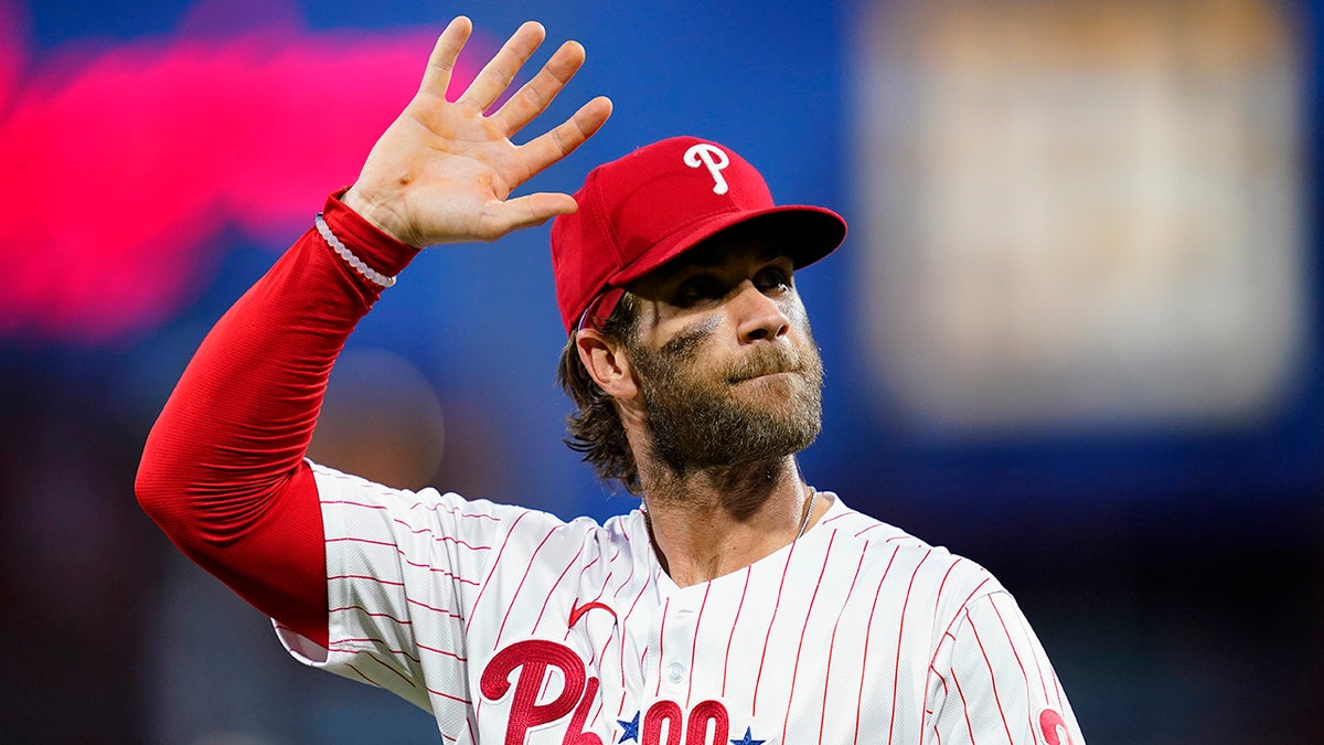 Philadelphia Phillies' Bryce Harper waves to the crowd before an interleague baseball game against the Baltimore Orioles, Wednesday, Sept. 22, 2021, in Philadelphia. 