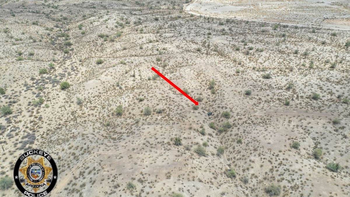 Police have searched 70 square miles since Robinson disappeared. In this photo, police point to Robinson's Jeep, which was found in a ravine on July 19.