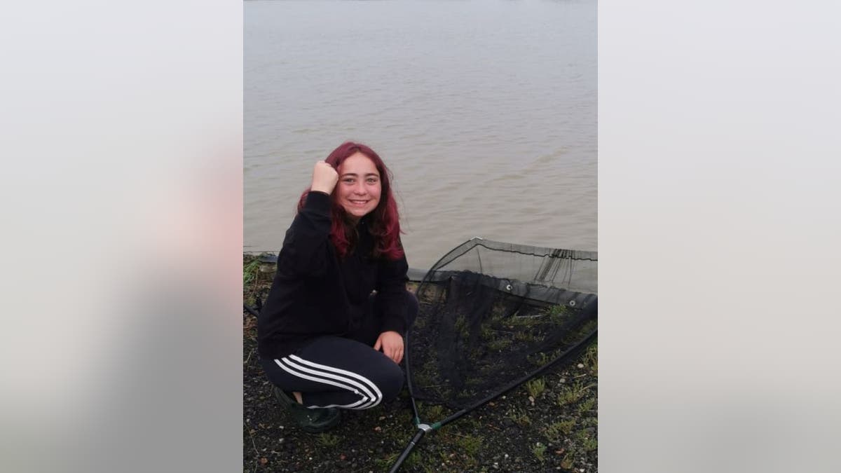 Hannah Truscott, 15, went fishing with her father Paul, 51, in Essex County, England. Her father told South West News Service she initially doubted her luck on Friday the 13th due to the superstition around the date.