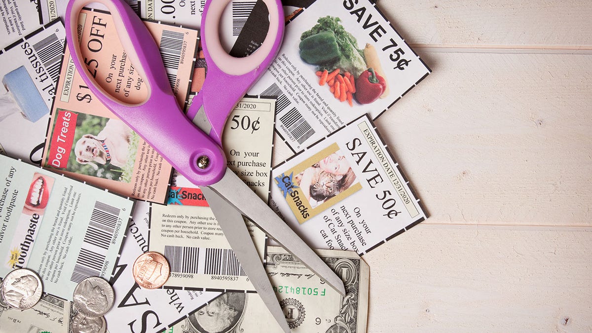 Coupons Pile With Scissors