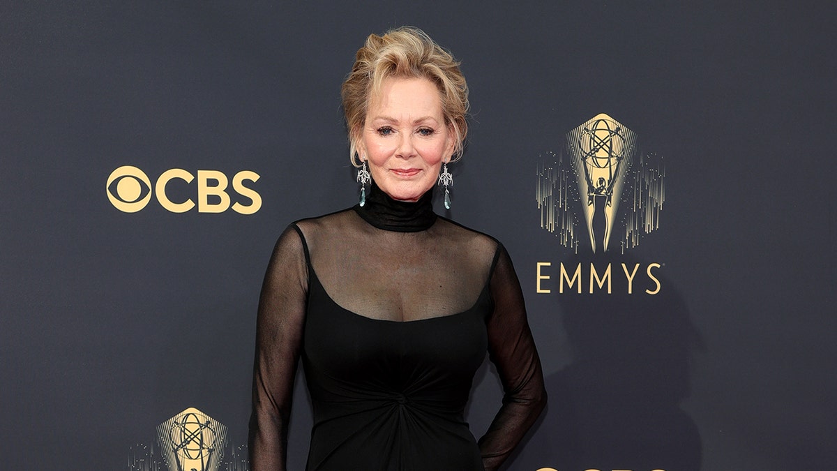 Jean Smart standing on the red carpet at the Primetime Emmy Awards in Los Angeles
