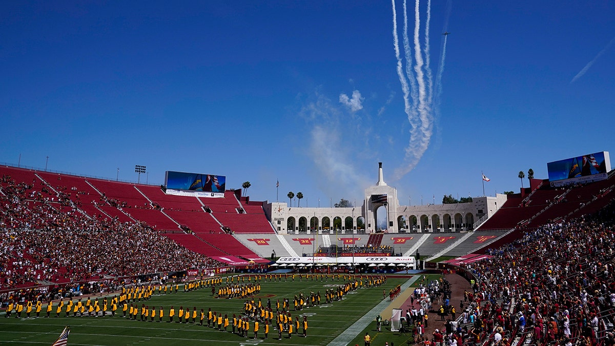 Airplanes fly over Los Angeles Memorial Coliseum before an NCAA college football game between San Jose State and Southern California Saturday, Sept. 4, 2021, in Los Angeles. (AP Photo/Ashley Landis)