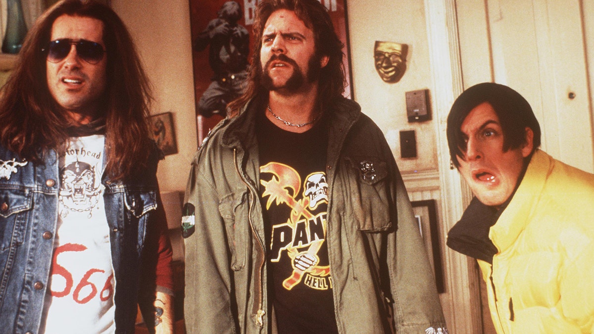 Actors Peter Dante, left, Jonathan Loughran and Adam Sandler act in a scene from 'Little Nicky.'