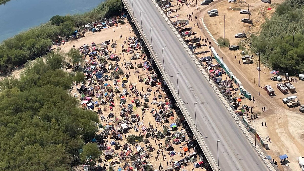 Migrants camp under the International Bridge in Del Rio, Texas.