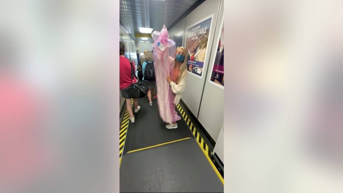 Natalie Browning boarded a Florida-bound flight on Aug. 1, 2021, with her wedding dress in tow, so she could dance with her grandfather.