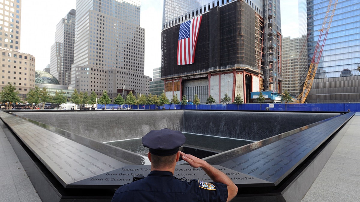 Police officer at the 9/11 memorial in New York City