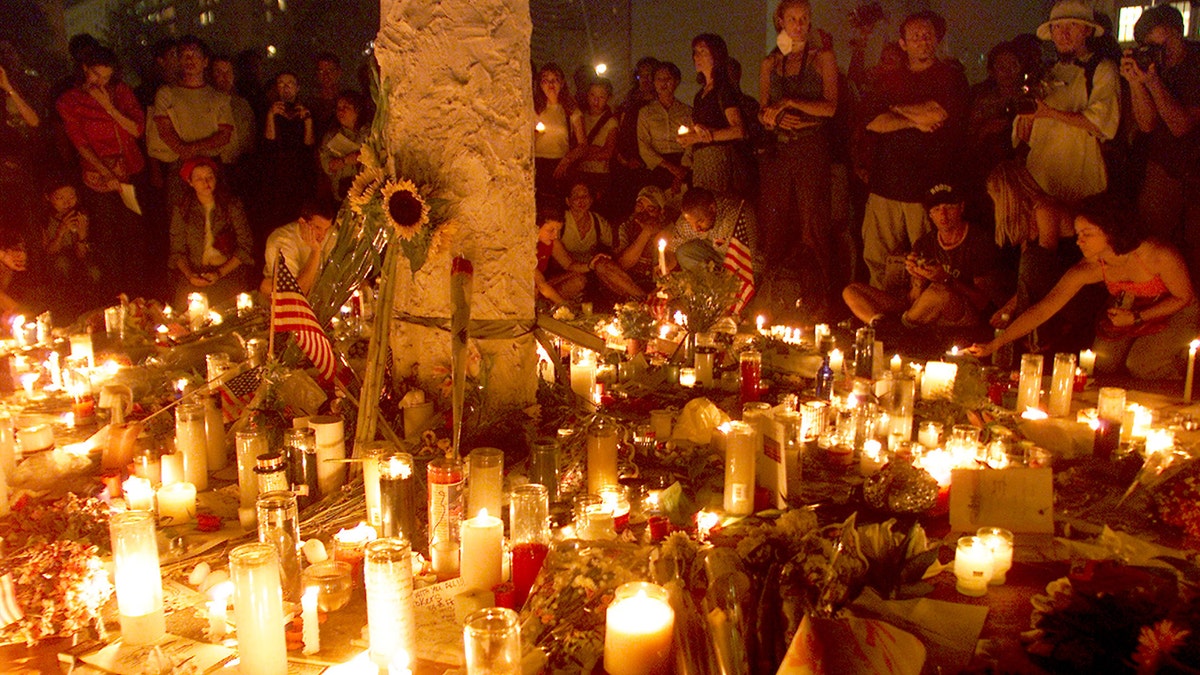 a candlelight vigil in nyc's union square after the 9/11 tragedy