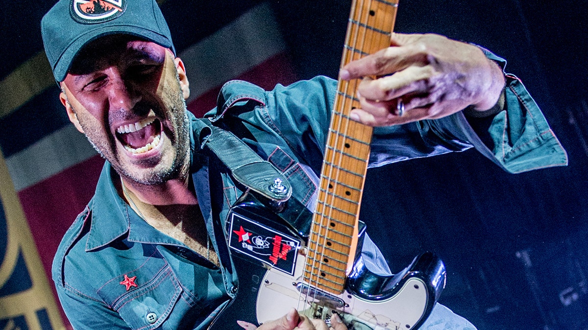 Tom Morello playing the guitar