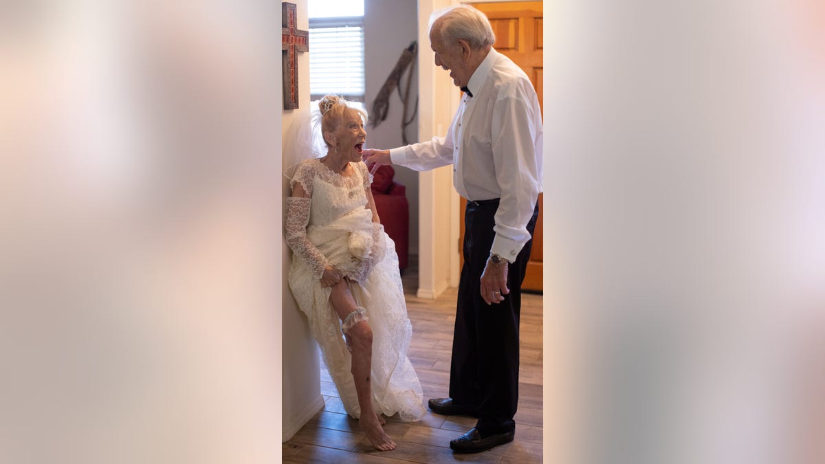 Karen even wore her veil and garter to the photo shoot.
