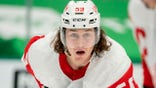 FILE - Detroit Red Wings left wing Tyler Bertuzzi (59) waits for the puck to drop during an NHL hockey game against the Dallas Stars in Dallas, in this Thursday, Jan. 28, 2021, file photo. Bertuzzi is the only unvaccinated Detroit Red Wings player going into training camp and faces the potential of missing all of his team's games in Canada this season as a result, general manager Steve Yzerman said Wednesday, Sept. 22, 2021. (AP Photo/Jeffrey McWhorter, File)