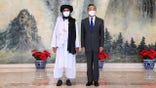 Chinese State Councilor and Foreign Minister Wang Yi meets with Mullah Abdul Ghani Baradar, political chief of Afghanistan's Taliban, in north China's Tianjin, July 28, 2021.