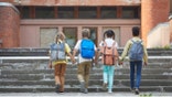 Young kids walk to school