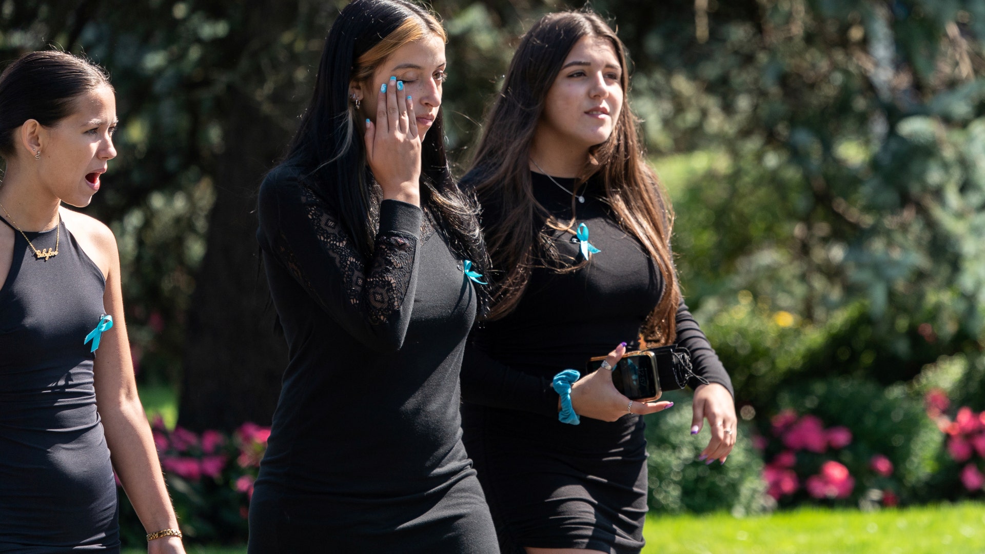 People leave a viewing during Gabby Petito's memorial service in Holbrook, New York, U.S., September 26, 2021.  