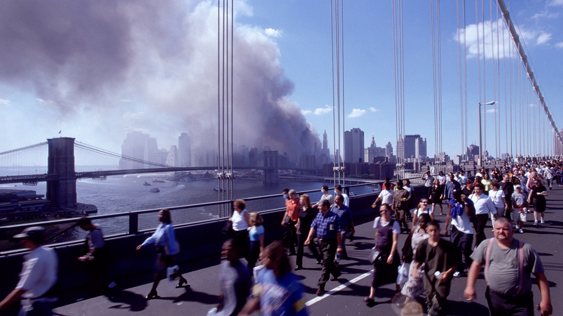 Walking to Brooklyn during 9/11 attacks. (Photo by Robert Essel NYC/CORBIS/Corbis via Getty Images)