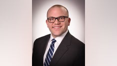 Pennsylvania prosecutor charged with raping a woman in her home