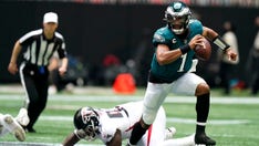 Hurts 3 TD passes, Smith scores, Eagles rout Falcons 32-6