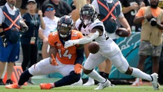Sutton's career day helps Broncos beat woeful Jaguars 23-13