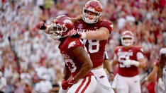 Arkansas manhandles No. 15 Texas, 40-21
