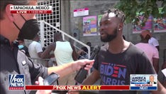 Haitian migrant sports 'Biden-Harris' shirt as thousands more converge at Guatemala-Mexico border