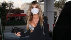 Heidi Klum puts on leggy display as she steps out for dinner in little black dress