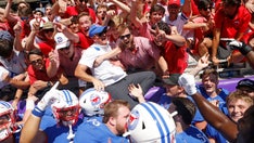 SMU defeats TCU; tries to plant flag on Horned Frogs’ logo and brawl ensues