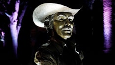 Bronze sculpture of Burt Reynolds unveiled at his gravesite 3 years after his death