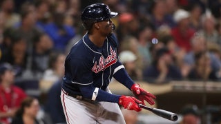 Soler, Braves win 10-8 in 10 innings to eliminate Padres