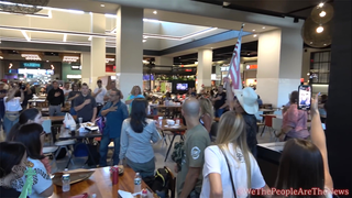 Watch anti-vaccine mandate protesters storm food court in Dem-run city