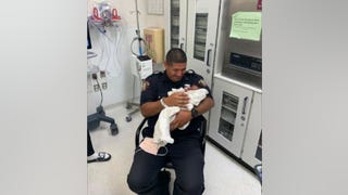 New Jersey police officer catches 1-month-old baby dropped off balcony