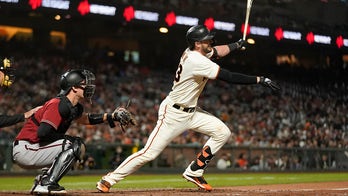 Bryant's sacrifice fly lifts Giants to win No 104