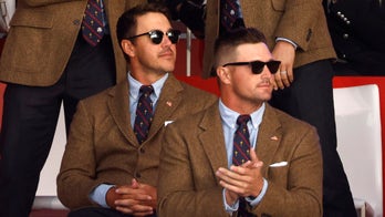 Bryson DeChambeau, Brooks Koepka hug it out after Ryder Cup win as teammates cheer on