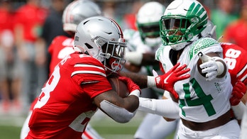 Ohio State falls while Iowa and Michigan shine