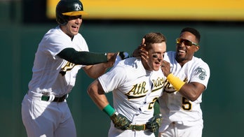 A's edge AL West-leading Astros again on walk-off hit in 9th
