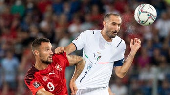 Italy sets unbeaten record; Germany, Spain top WCup groups