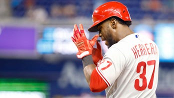 Herrera hits RBI single in 10th, Phils avoid sweep in Miami