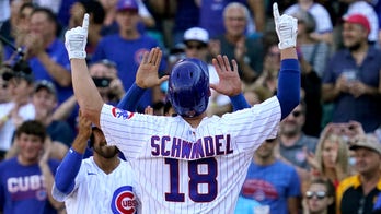 Schwindel's grand slam lifts Cubs over Pirates 11-8