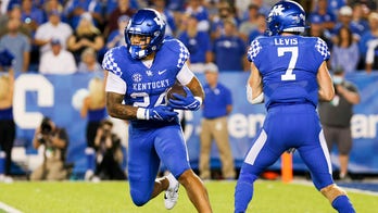 Rodriguez's 3 TDs help Kentucky hold off Missouri 35-28