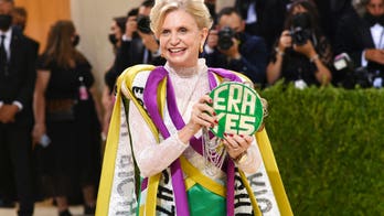 NY Rep. Carolyn Maloney shows up at 2021 Met Gala wearing a gown in suffragist colors