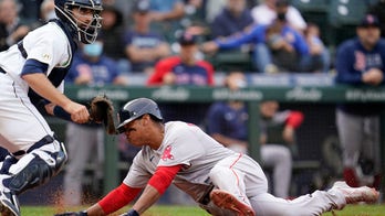 Schwarber, Vazquez power Red Sox past Mariners 9-4 in 10